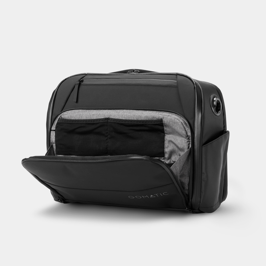 Gomatic Black Messenger Bag Open Pocket Front Angle View